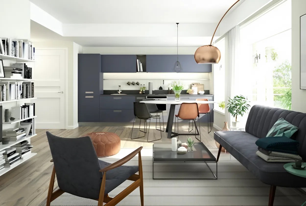 Living room and kitchen with soft neutral wall paint and matte blue-gray cabinetry by an interior painter in Worthington, OH