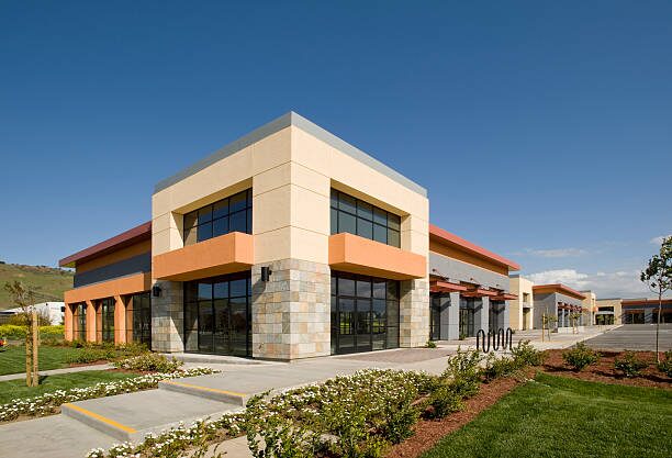 Building with a warm beige and terracotta exterior color palette by a painting company in Columbus, OH.